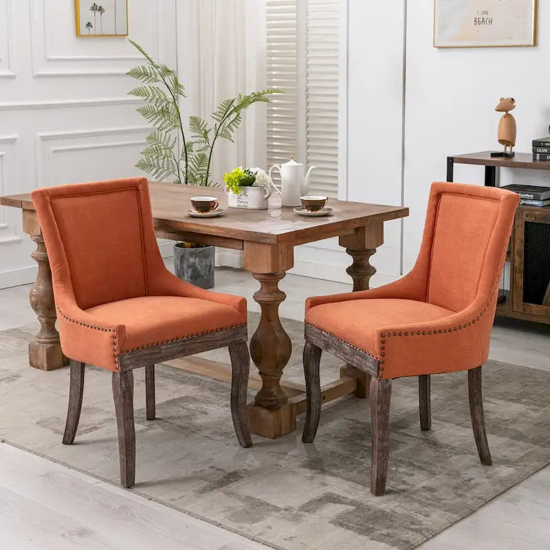 Ultra Side Dining ChairThickened fabric chairs with neutrally toned solid wood legs Bronze nail headSet of 2Blue