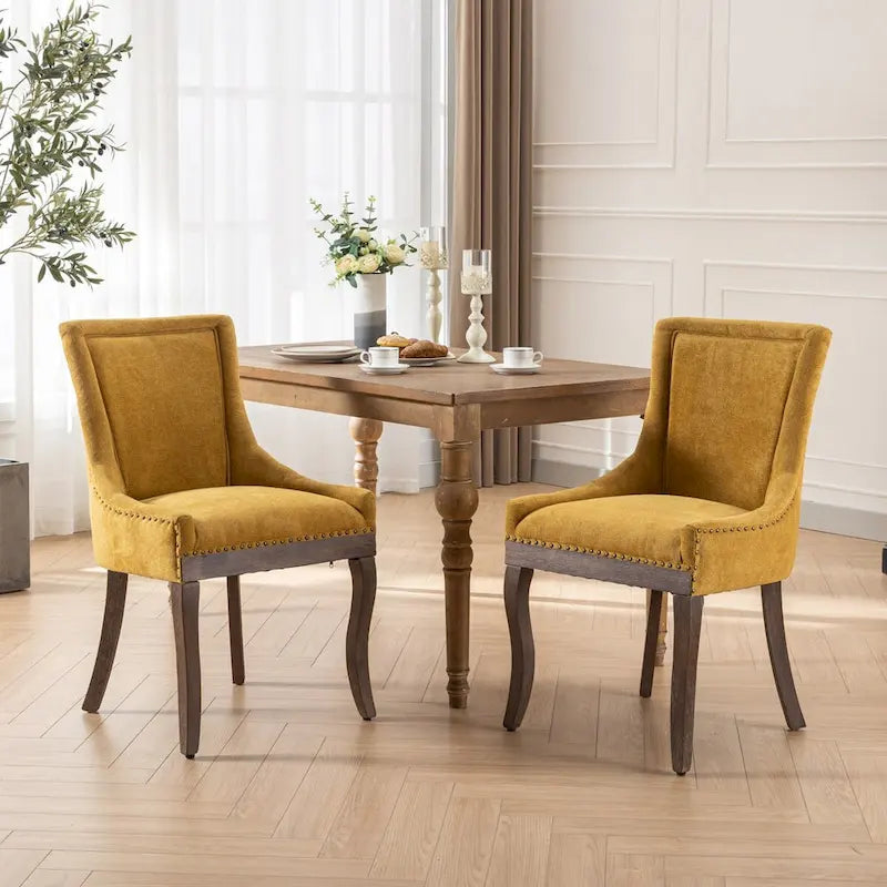 Ultra Side Dining ChairThickened fabric chairs with neutrally toned solid wood legs Bronze nail headSet of 2Blue